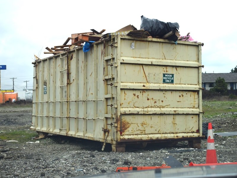 9-yard roll-off bin loaded with kitchen-renovation debris
