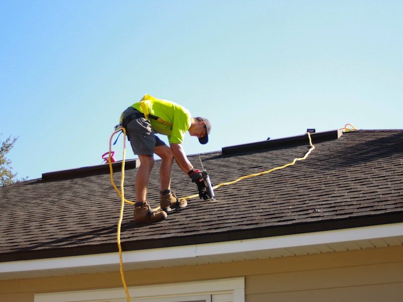 Ottawa roofing contractor on a residential roof during a shingle tear-off