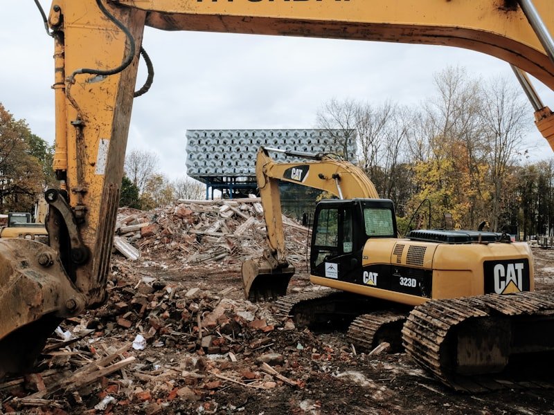 CAT excavator on a Canadian demolition site, the kind of project our 30-yard bin services